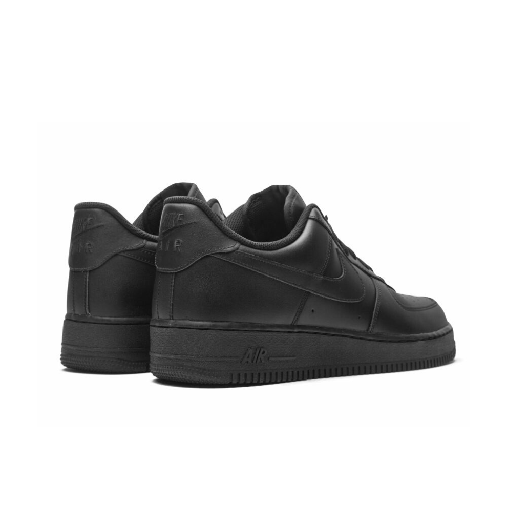 Black Nike sneakers on a white background