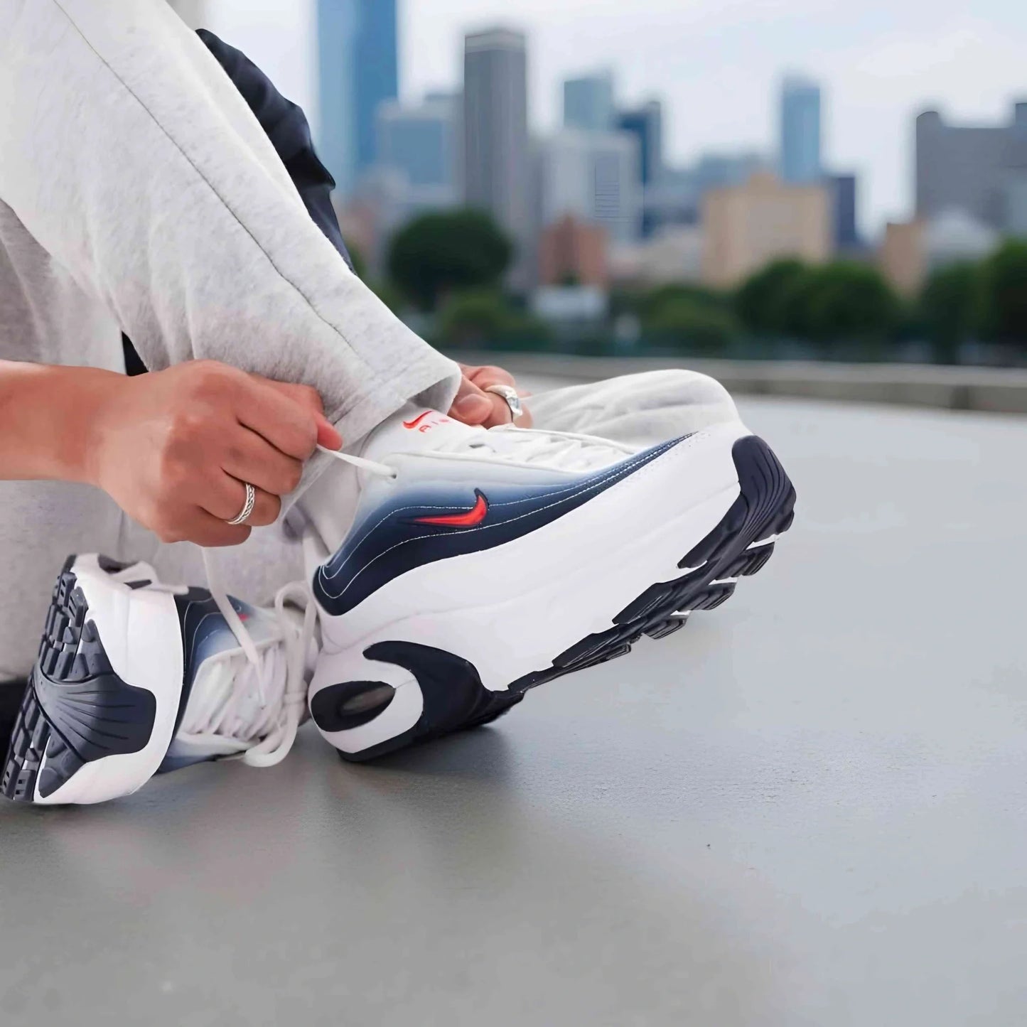 Nike Air Max Portal in White/Midnight Navy/Bright Crimson.