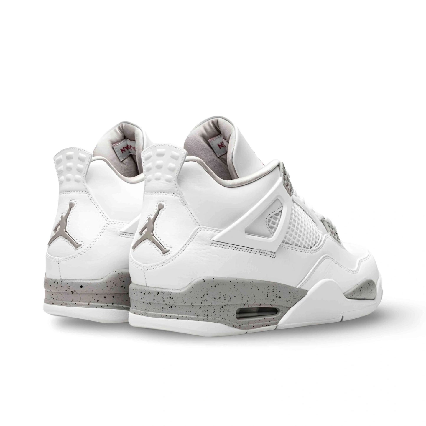 Air Jordan 4 Retro in White/Oreo.