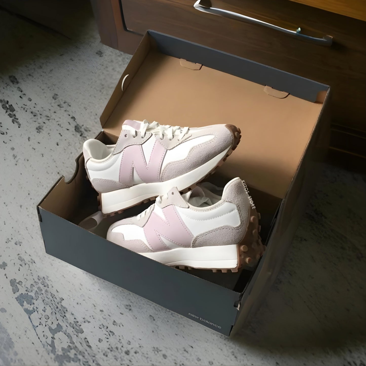 New Balance 327 in Moonbeam/Stone Pink.