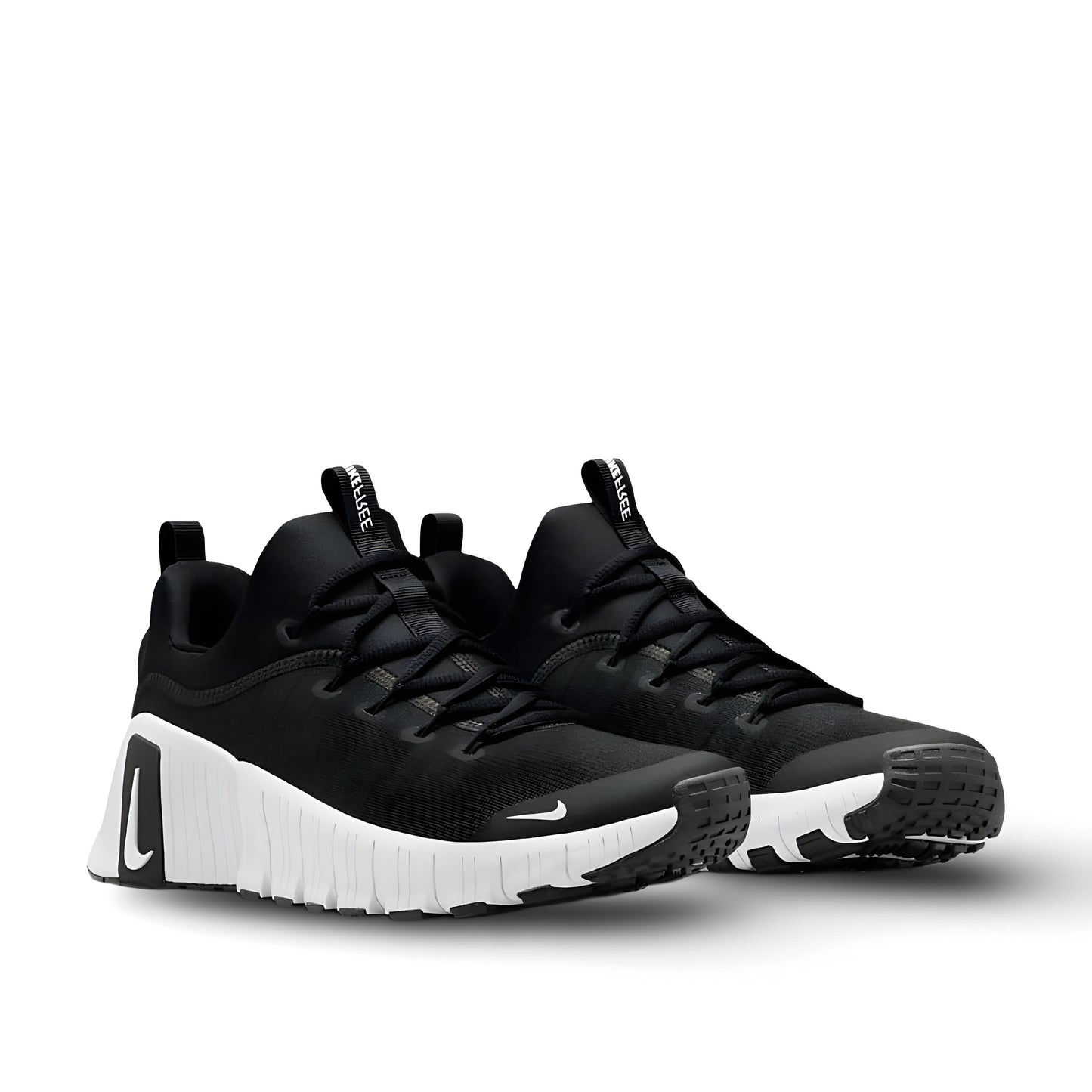Nike Free Metcon 6 shoes in black and white.