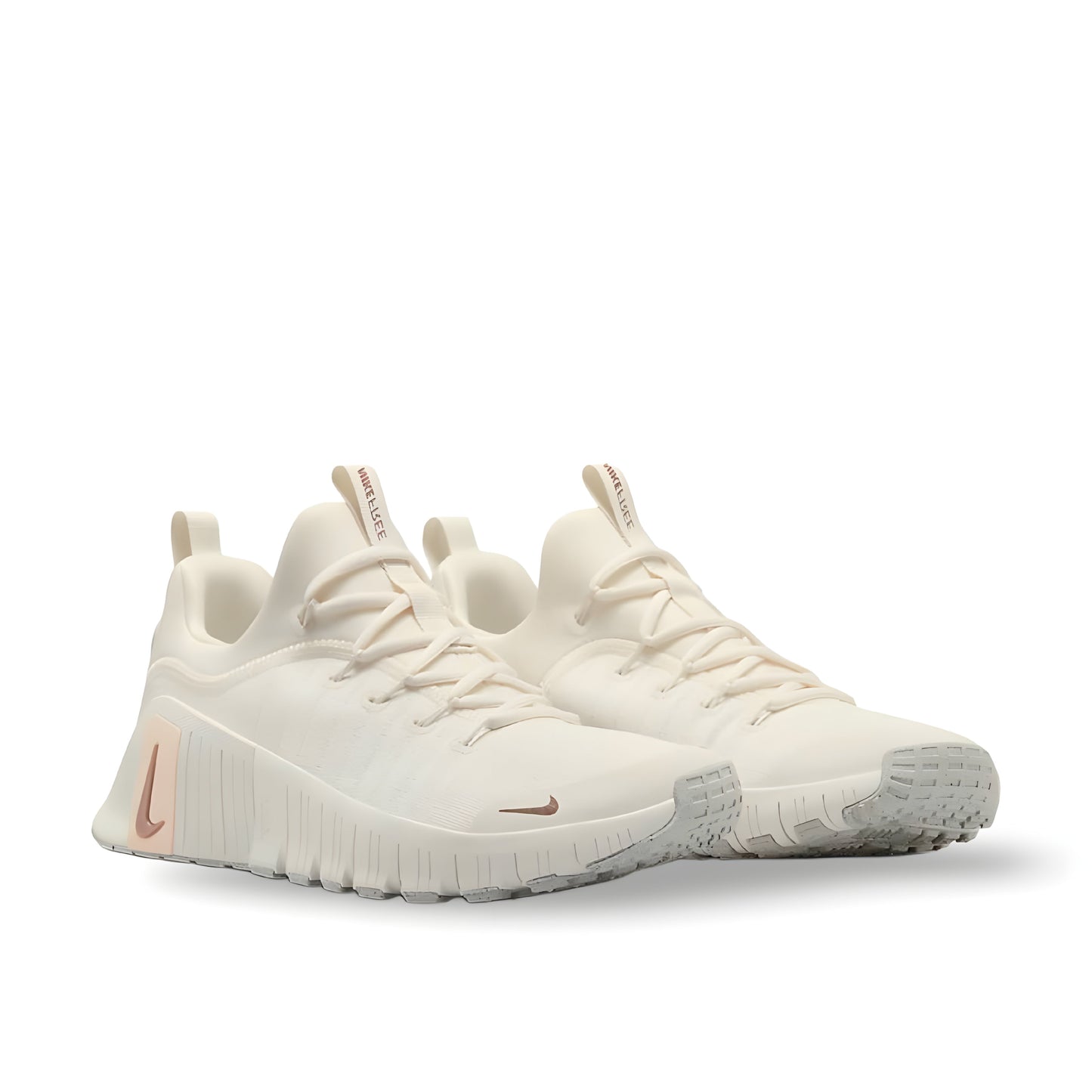 Nike Free Metcon 6 women's shoes in Ivory/Guava Ice/Sail/Metallic Red Bronze.