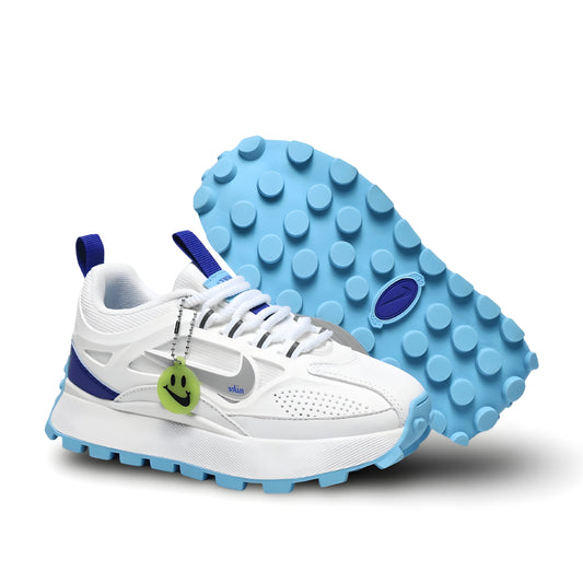 Nike Bailleli in white, blue, and silver.