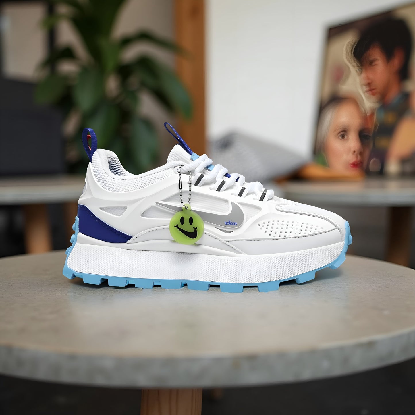 Nike Bailleli in white, blue, and silver.