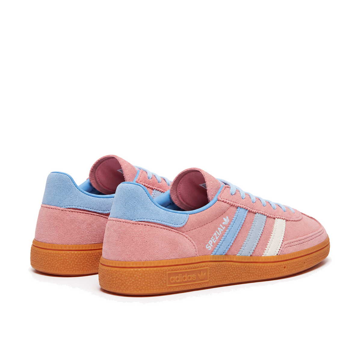 Rear three-quarter view of Semi Pink Spark Handball Spezial sneakers showing blue heel panels and gum rubber soles