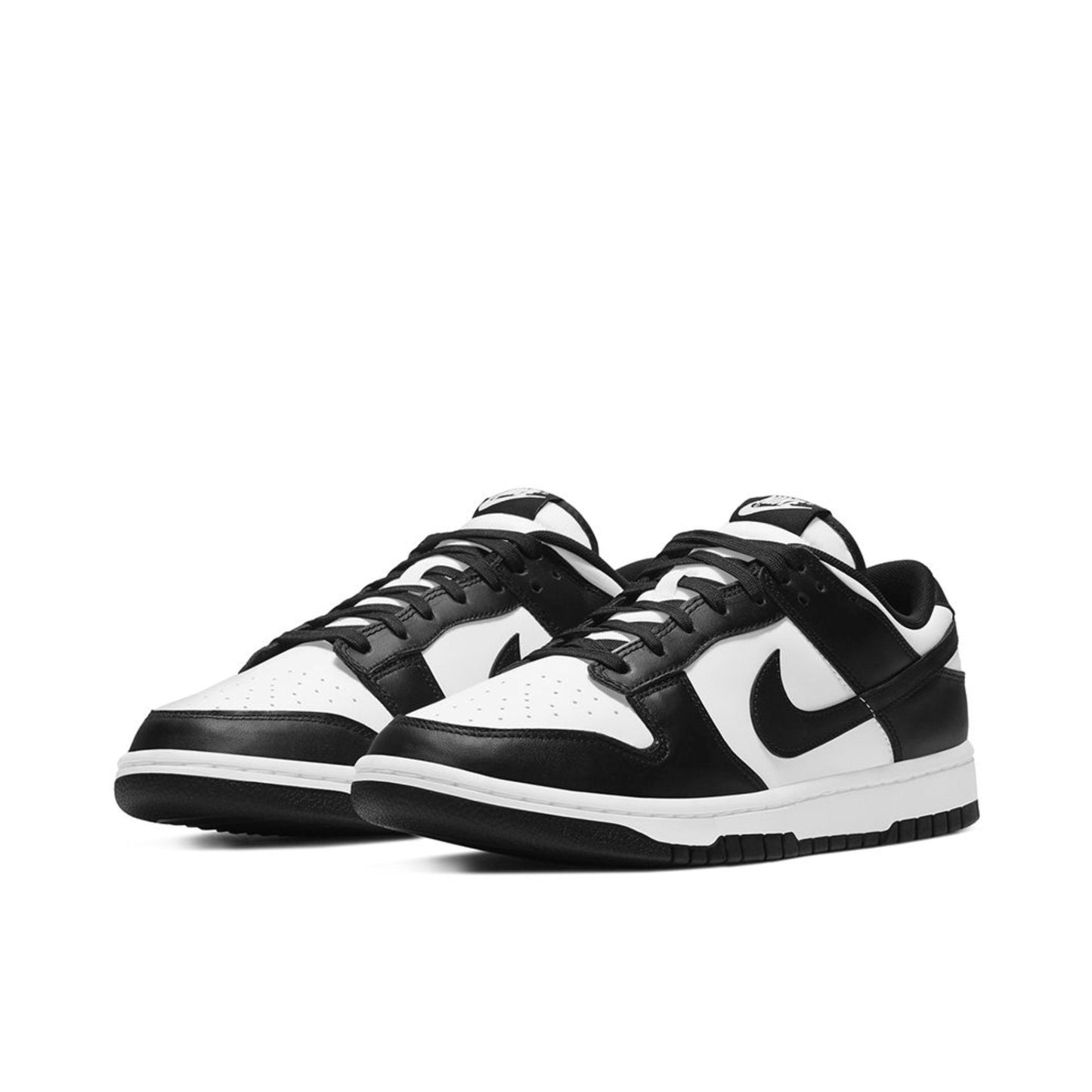 Black and white sneakers with Nike logo on a white background