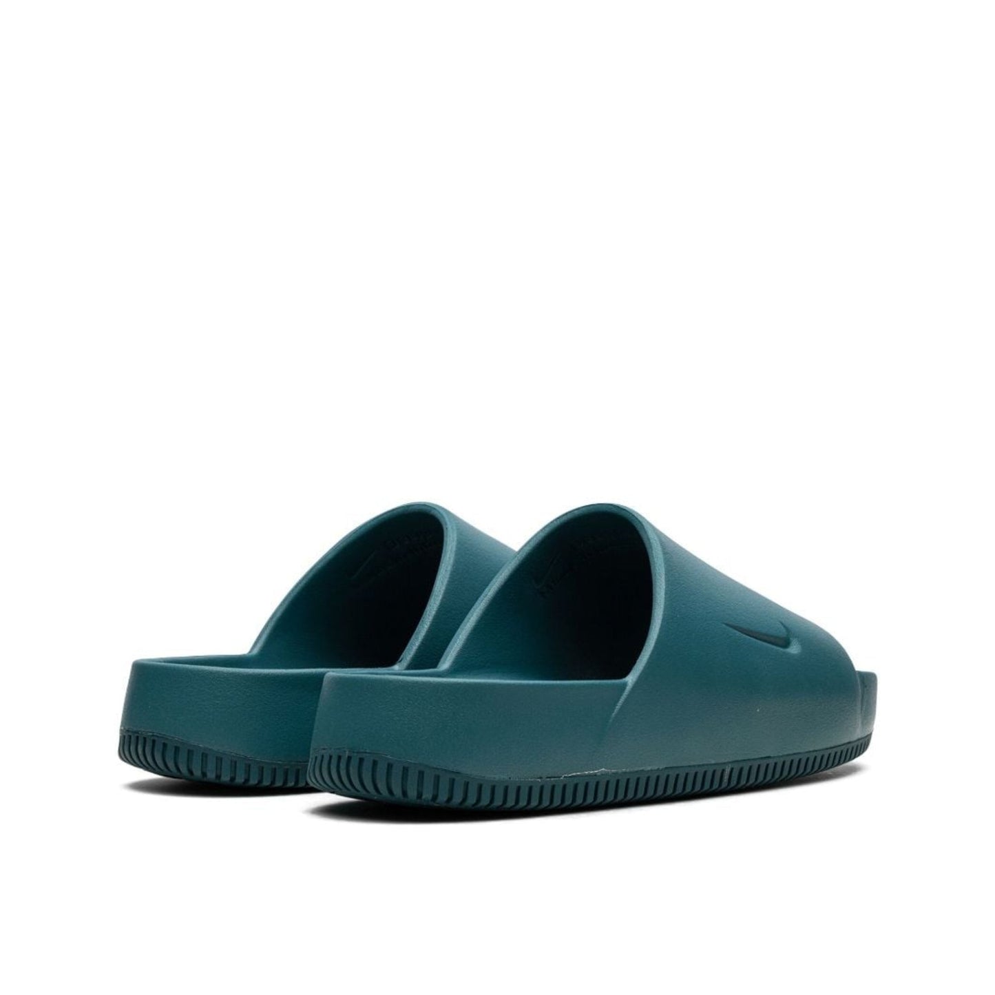 Nike Calm Geode Teal slides.