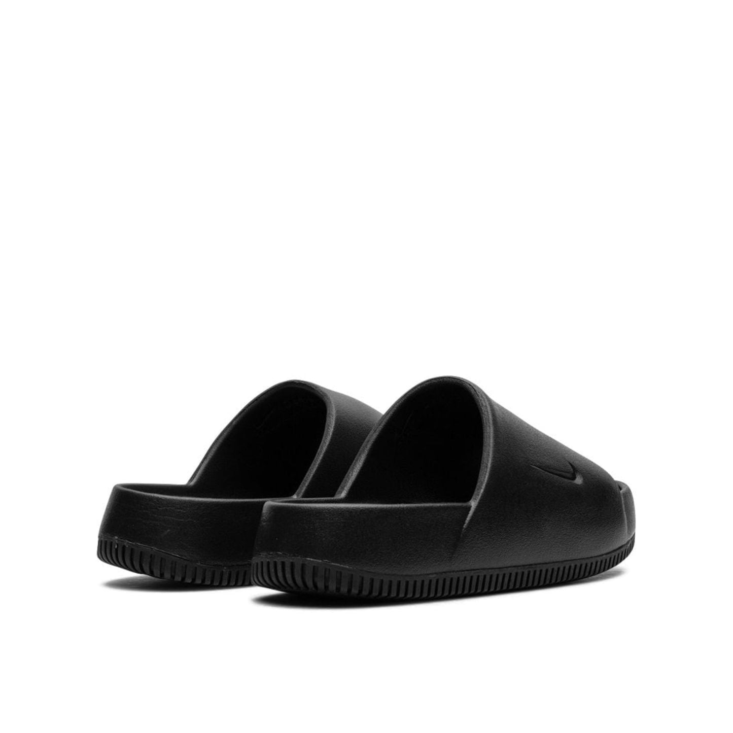 Nike Calm black slides.