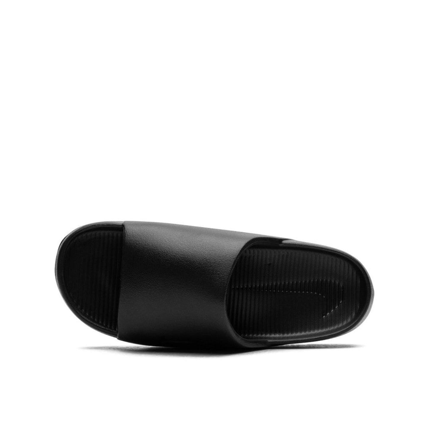 Nike Calm black slides.
