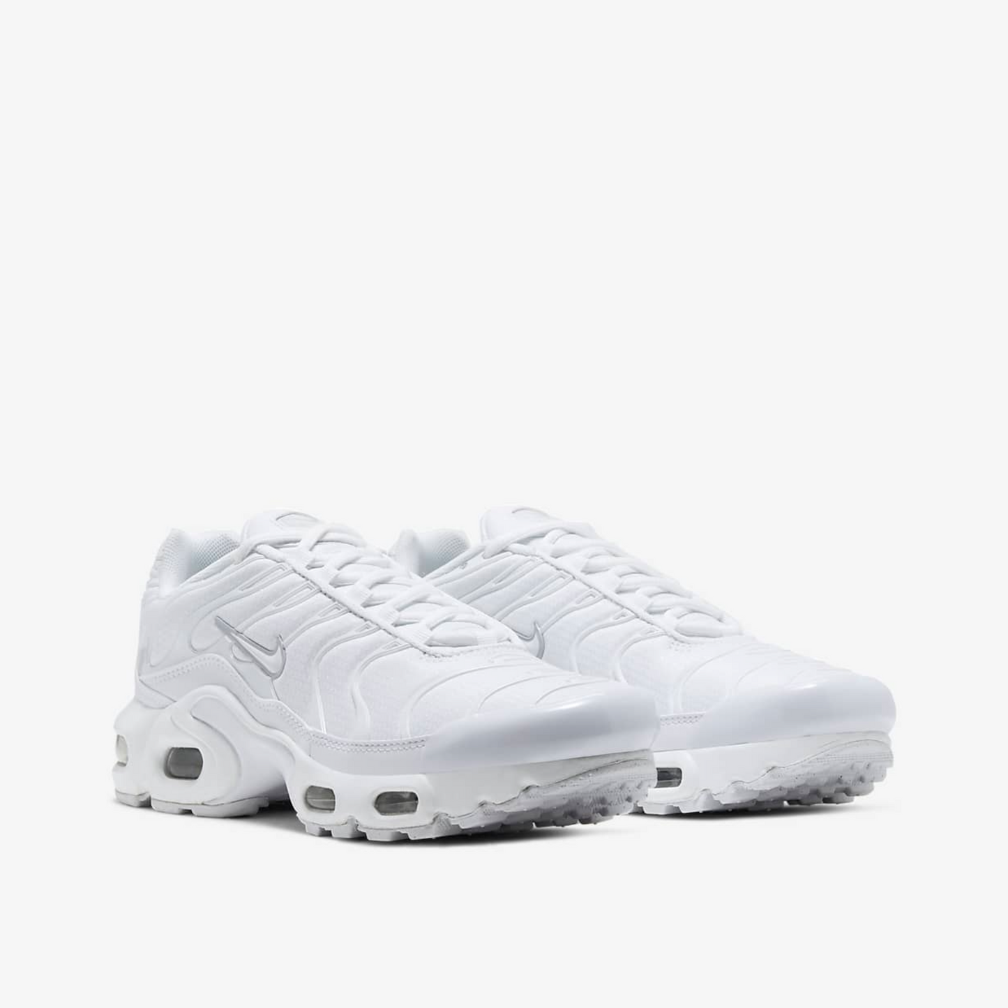 Nike Air Max Plus in white.
