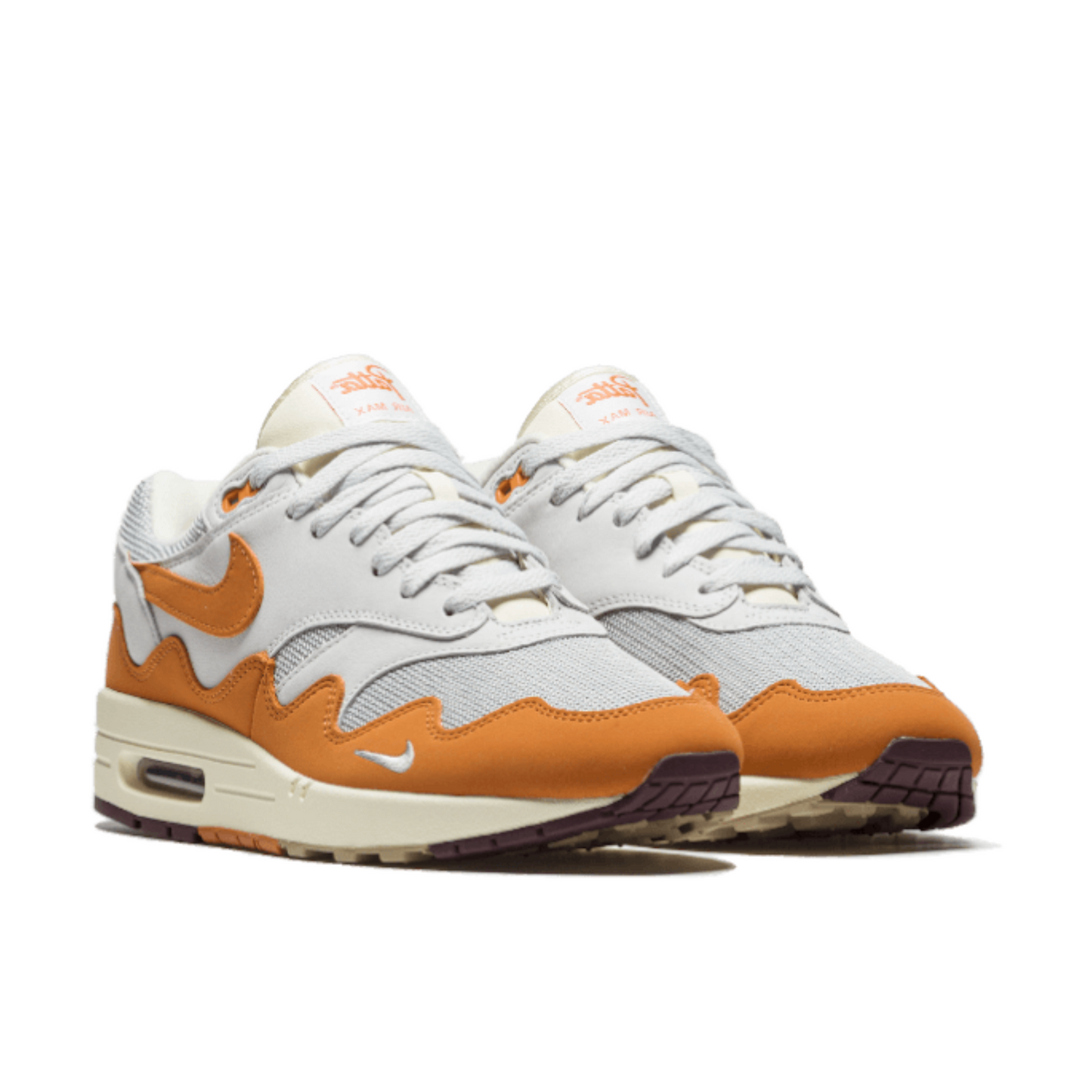 Nike Air Max 1 in Neutral Grey, Safety Orange, White, and Black.