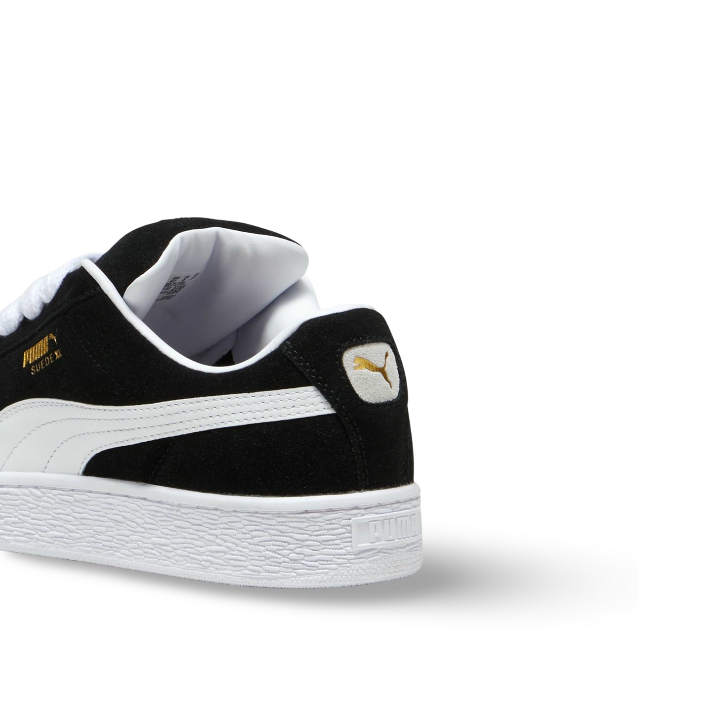 Puma Suede XL Unisex Sneakers in Black and White.