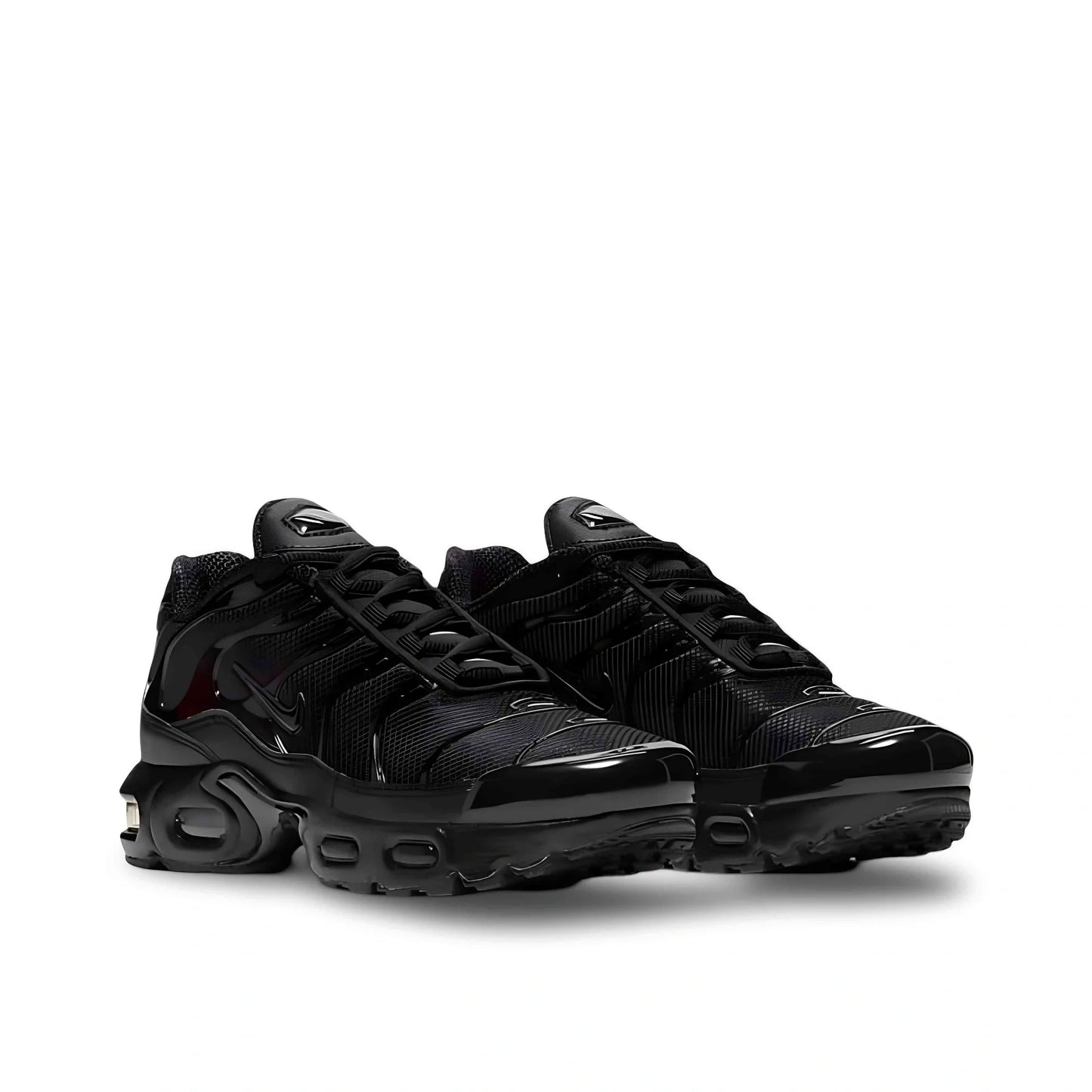 Nike Air Max Plus "Triple Black" children's shoe.