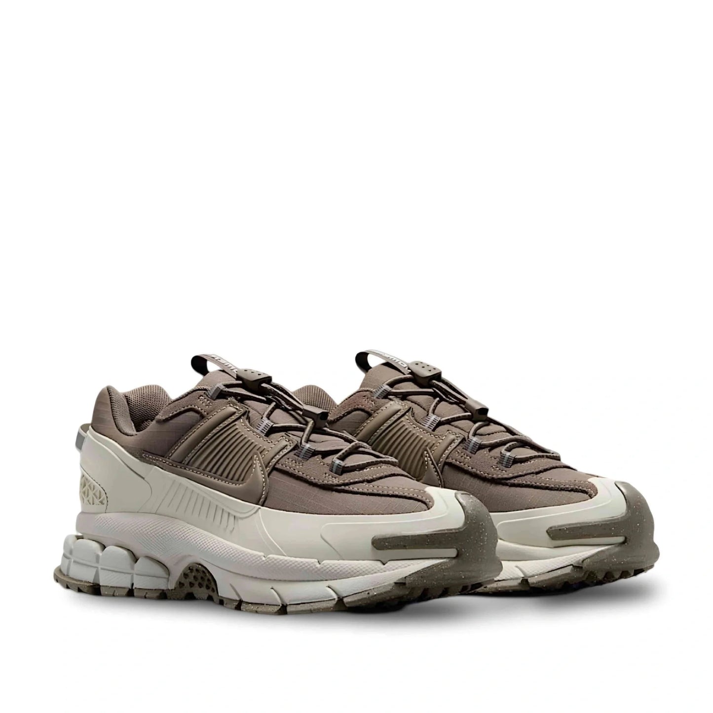 Nike Zoom Vomero Roam Winterized in Light Bone/Court Purple/Gum Dark Brown/Mink Brown.