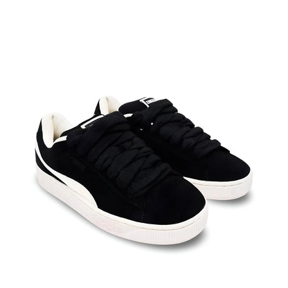 Puma Suede XL "Pleasures" in black.