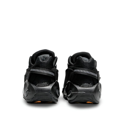 Nike Glide "Triple Black" by NOCTA.
