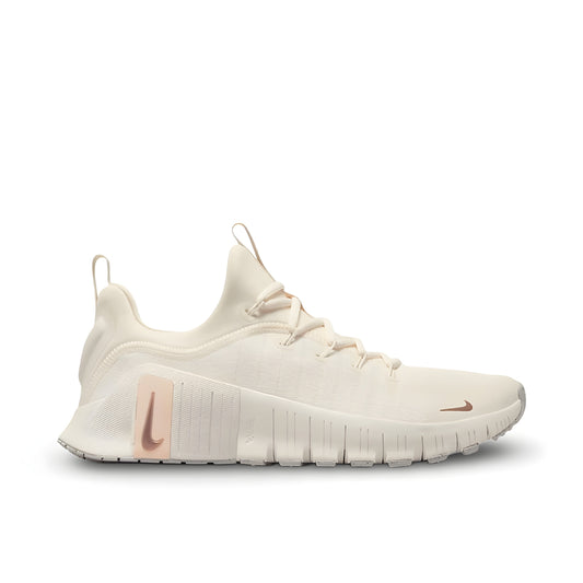 Nike Free Metcon 6 women's shoes in Ivory/Guava Ice/Sail/Metallic Red Bronze.