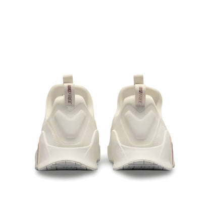 Nike Free Metcon 6 women's shoes in Ivory/Guava Ice/Sail/Metallic Red Bronze.