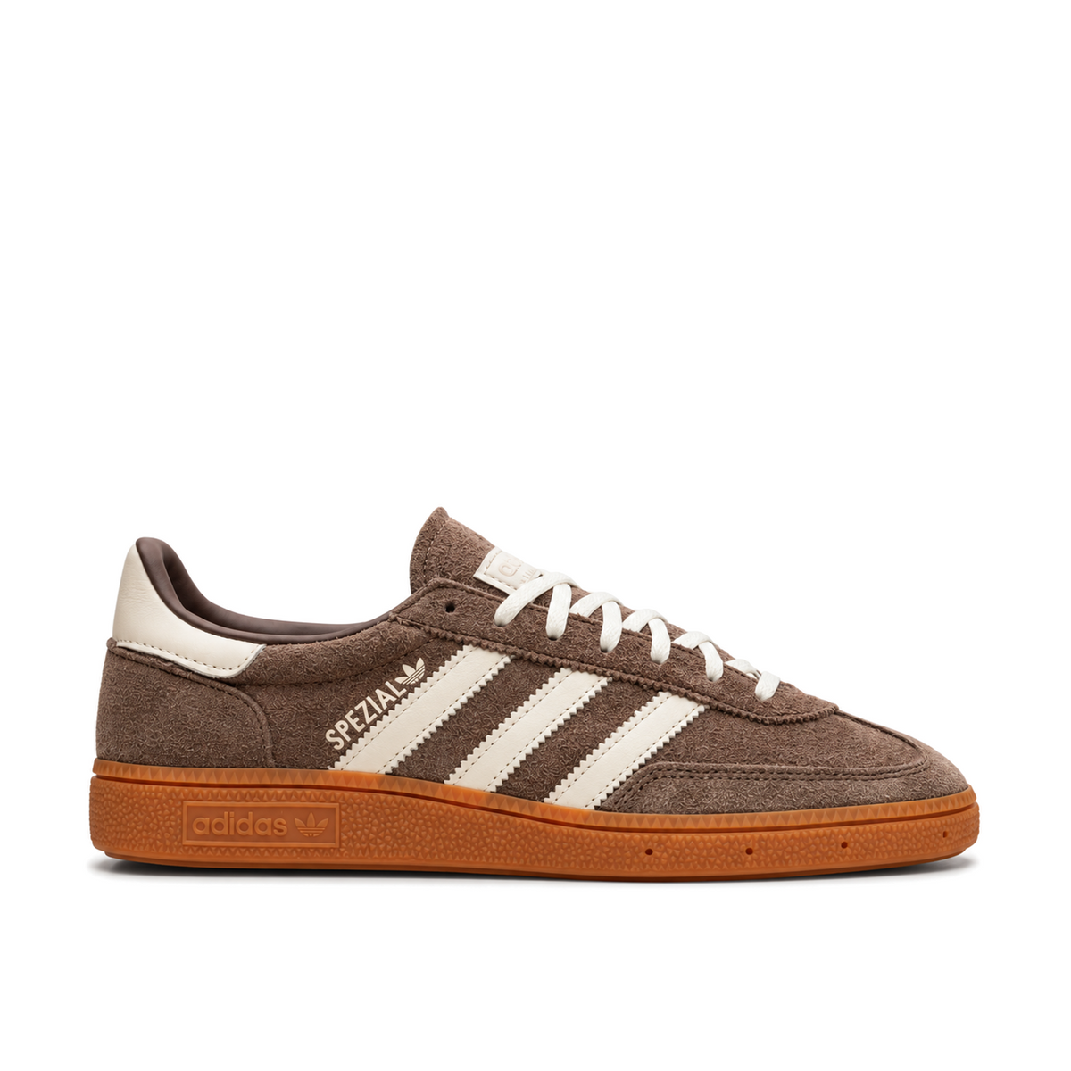 Right-facing side view of the brown adidas Handball Spezial with cream Three Stripes, matching laces and a warm gum sole.