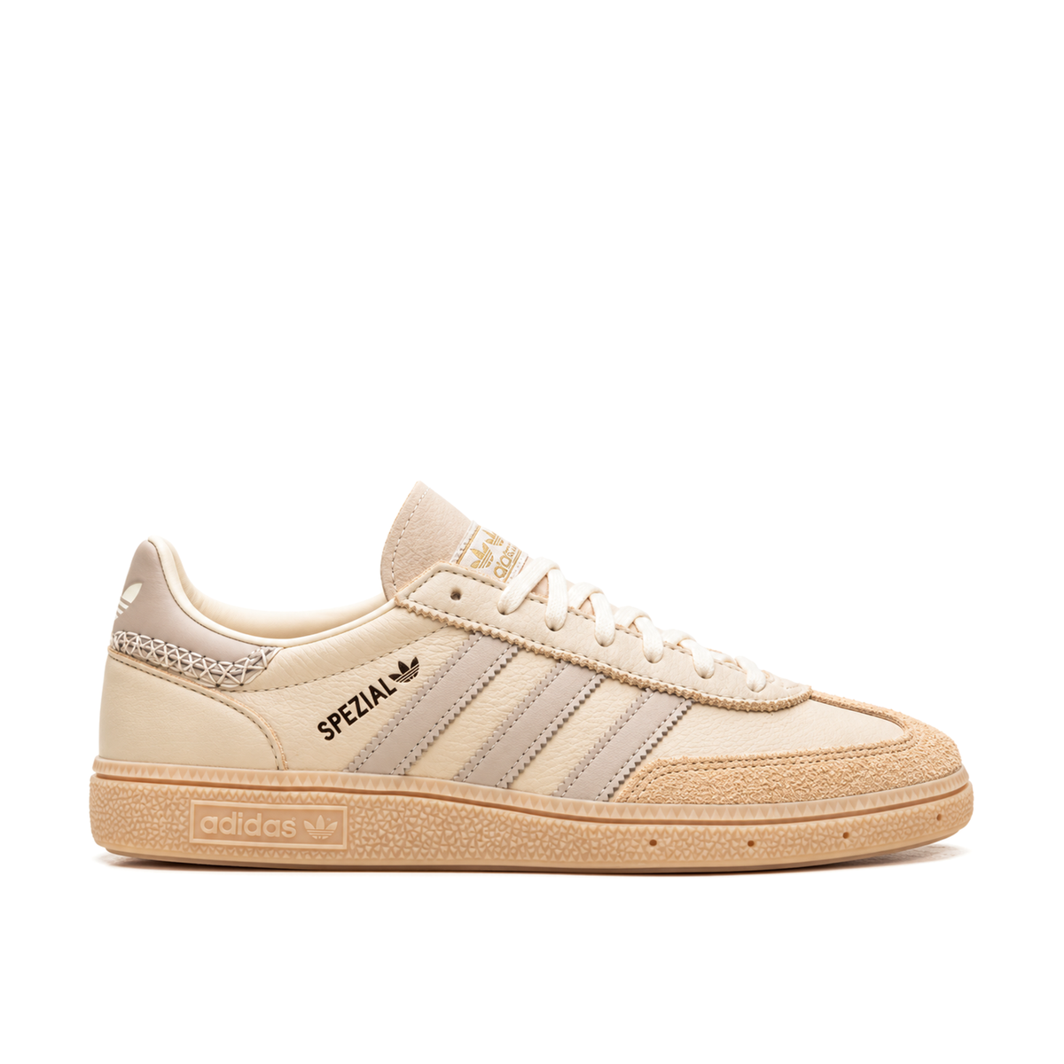 Right-facing side view of adidas Handball Spezial Cream White Beige with pale Three Stripes, frayed eyestay edging and a beige gum sole