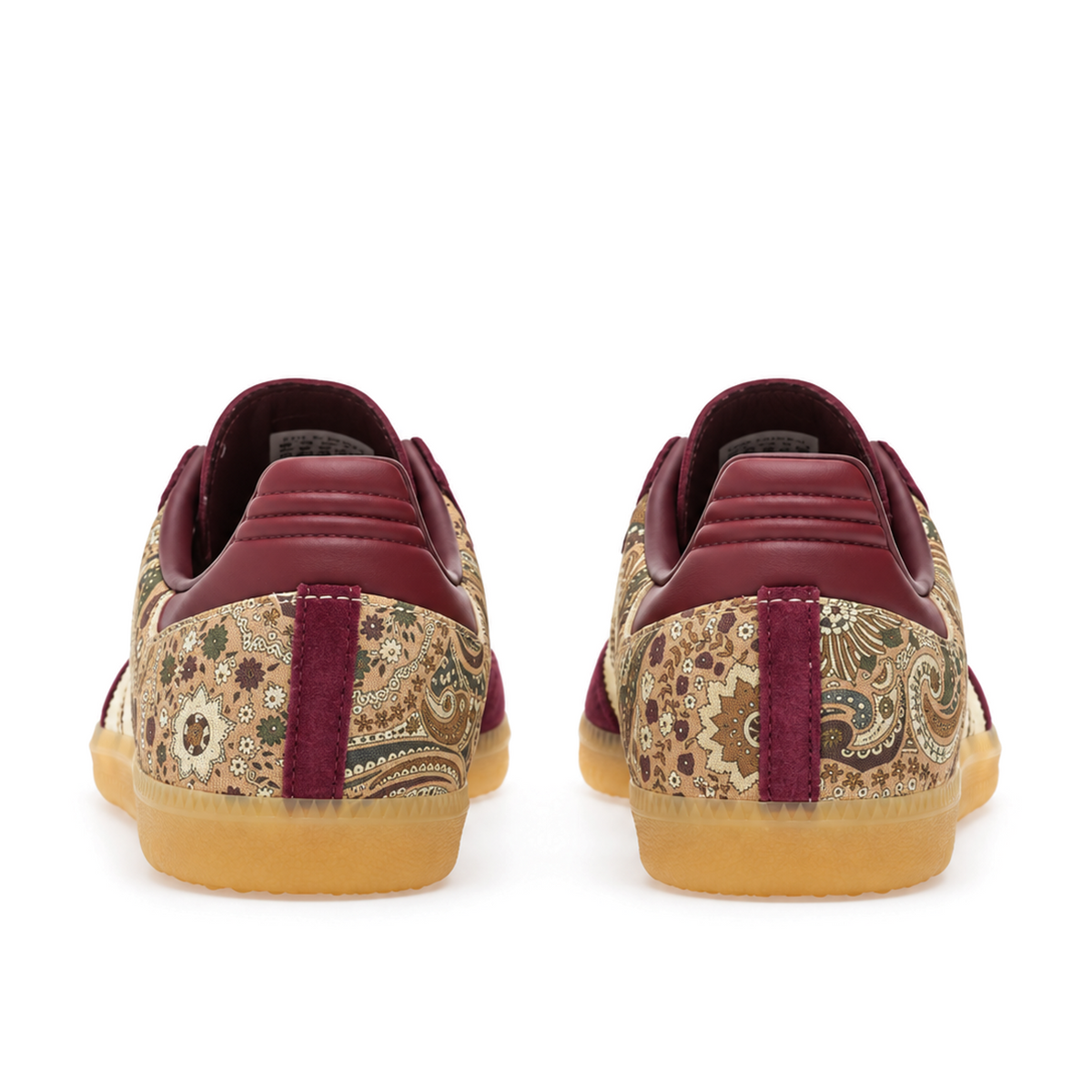 Rear view of the adidas x Liberty London Samba OG pair with paisley heels, maroon centre strips and gum soles