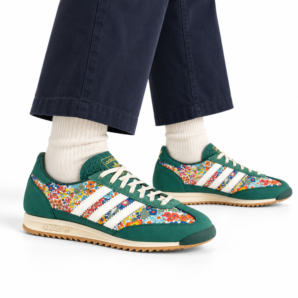 adidas Originals x Liberty London SL 72 OG – Green Floral worn with navy cropped cotton trousers and ecru ribbed socks, both shoes facing right