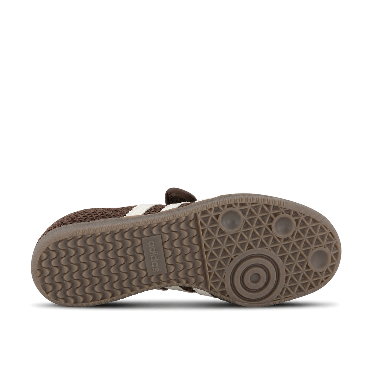 Horizontal taupe-brown outsole of adidas Originals Samba Jane Brown Off White Gold with wavy heel tread on the left and circular forefoot tread on the right