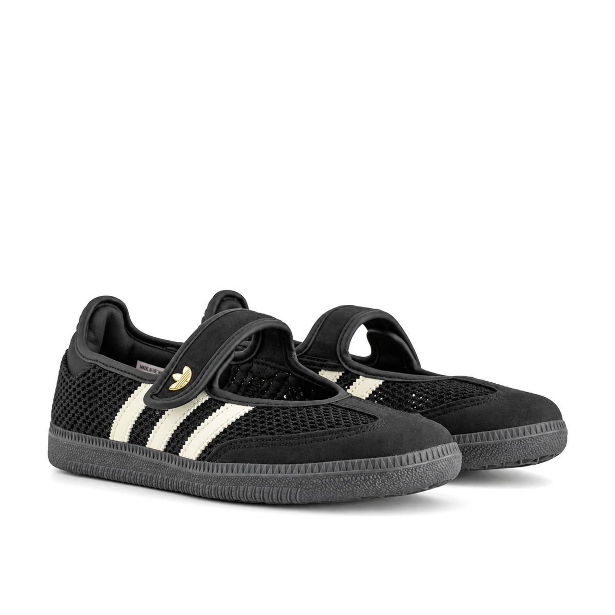 Right-facing front three-quarter pair of adidas Originals Samba Jane Core Black Off White Gold with rounded black straps and mesh toe panels