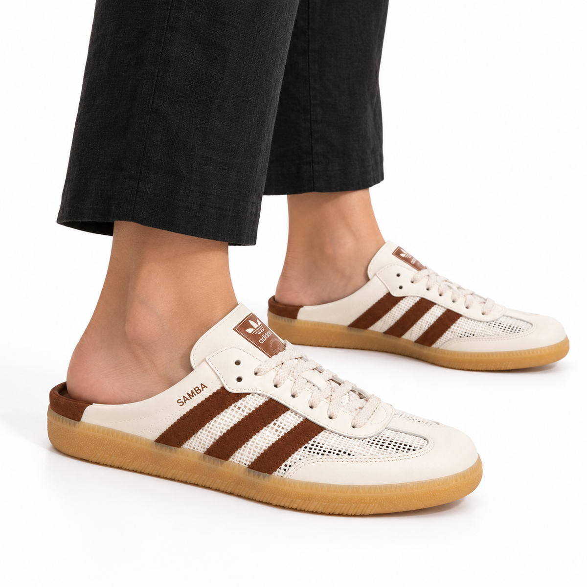 adidas Samba Mule – Off-White & Brown worn with black cropped linen trousers with bare ankles, both shoes facing right