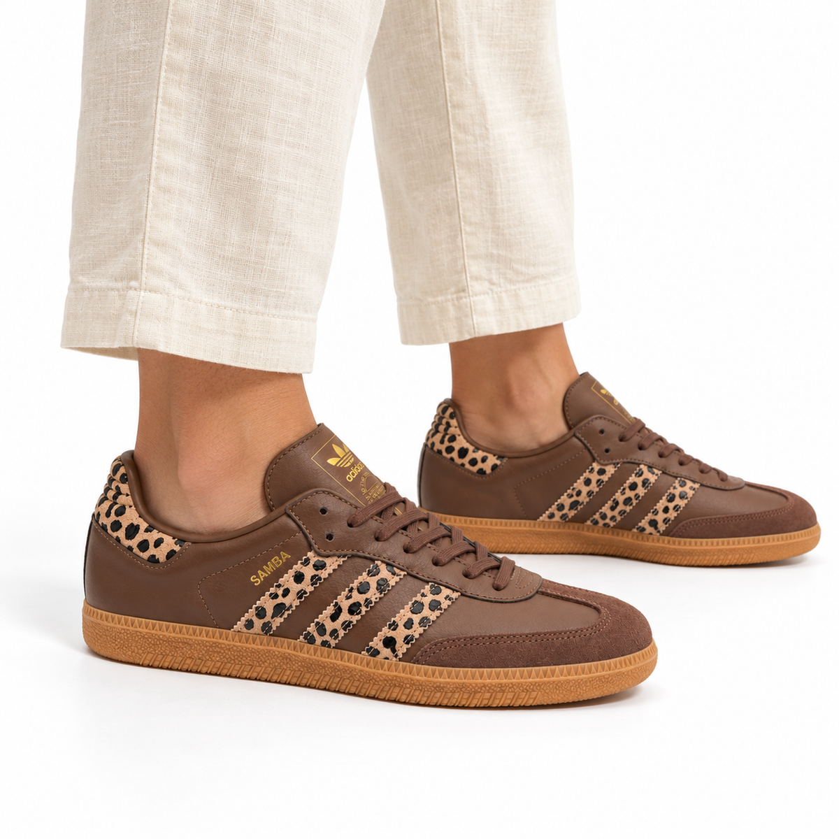 adidas Samba OG – Brown Leopard worn with ivory linen trousers with bare ankles, both shoes facing right