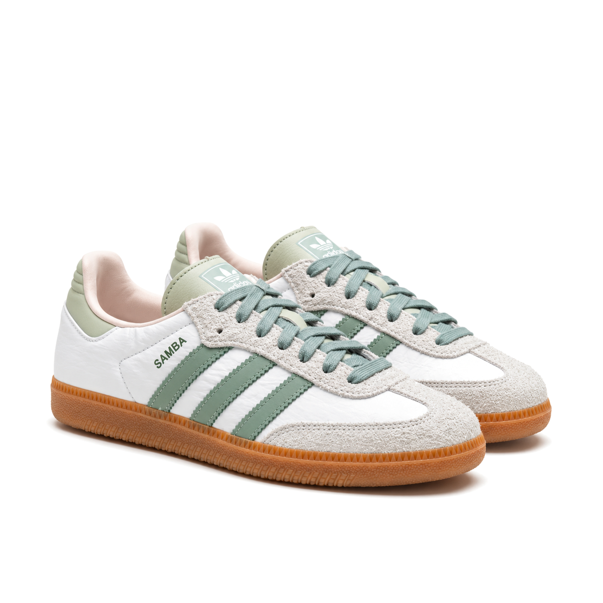 Right-facing front three-quarter pair of adidas Samba Silver Green shoes with light grey toe overlays and green laces