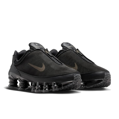 Pair of Nike Shox TL Winterized Black and Cave Stone unisex sneakers