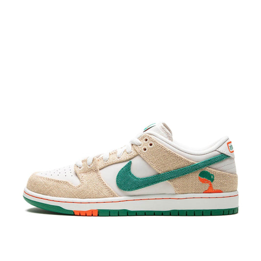 Nike SB Dunk Low 'Jarritos' with a white leather base, tan overlays, orange suede detailing, green Swoosh, and orange laces.