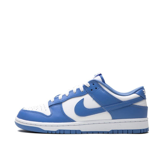 Nike Dunk Low 'Polar Blue' with white base color and blue overlays, including the Swoosh logo, perforated toe boxes, and woven Nike tags.