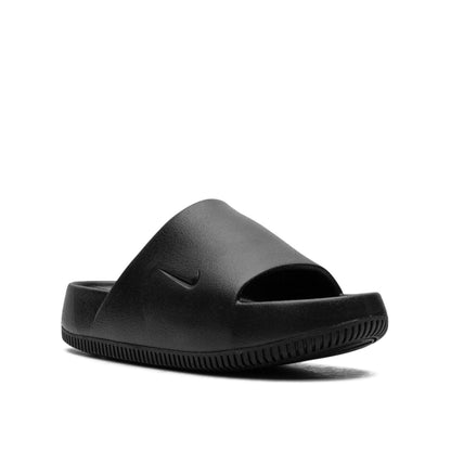 Nike Calm black slides.