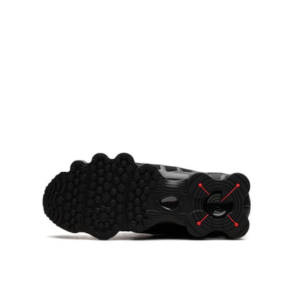 Nike Shox TL in Black and Max Orange.