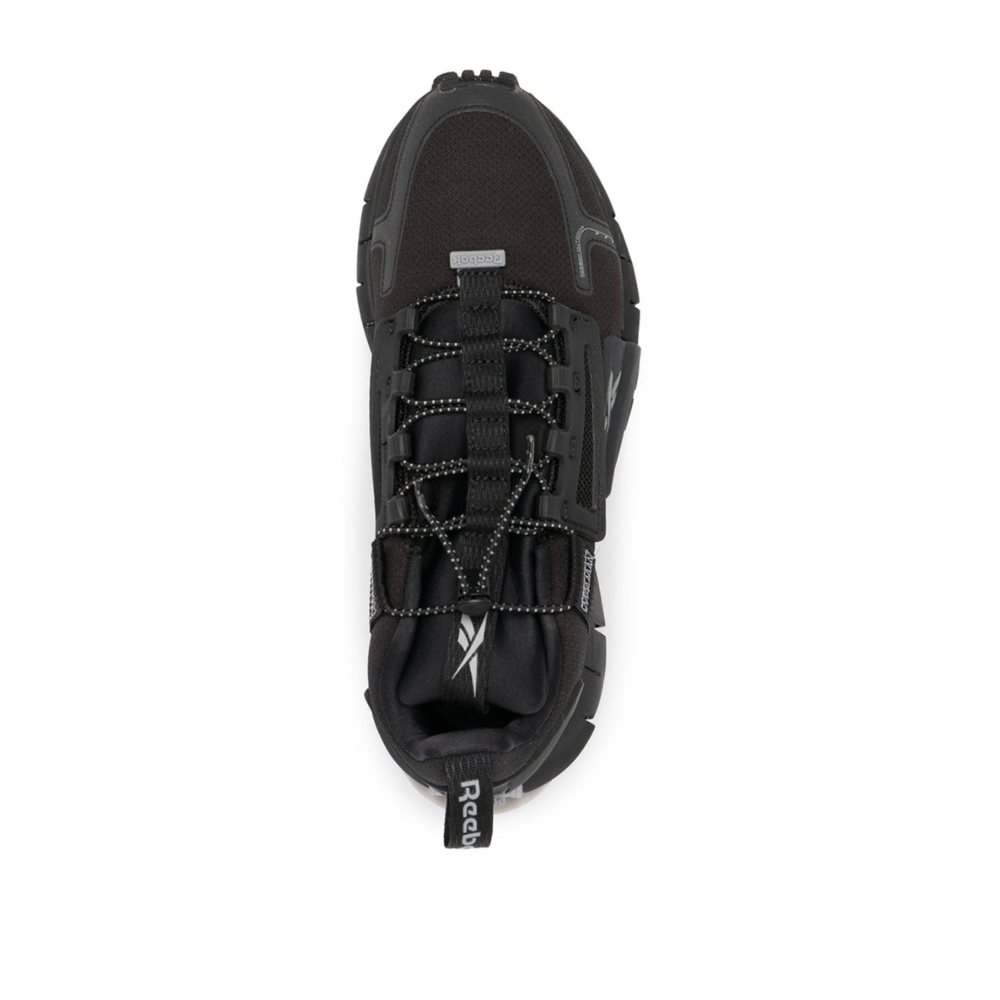 Reebok Zig Kinetica Edge Trainers in Black.