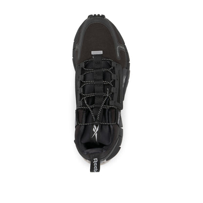 Reebok Zig Kinetica Edge Trainers in Black.