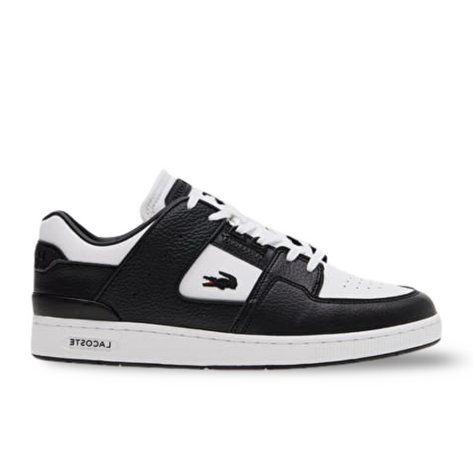 Lacoste Court Cage sneakers in white and black.