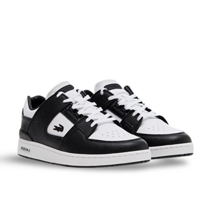 Lacoste Court Cage sneakers in white and black.